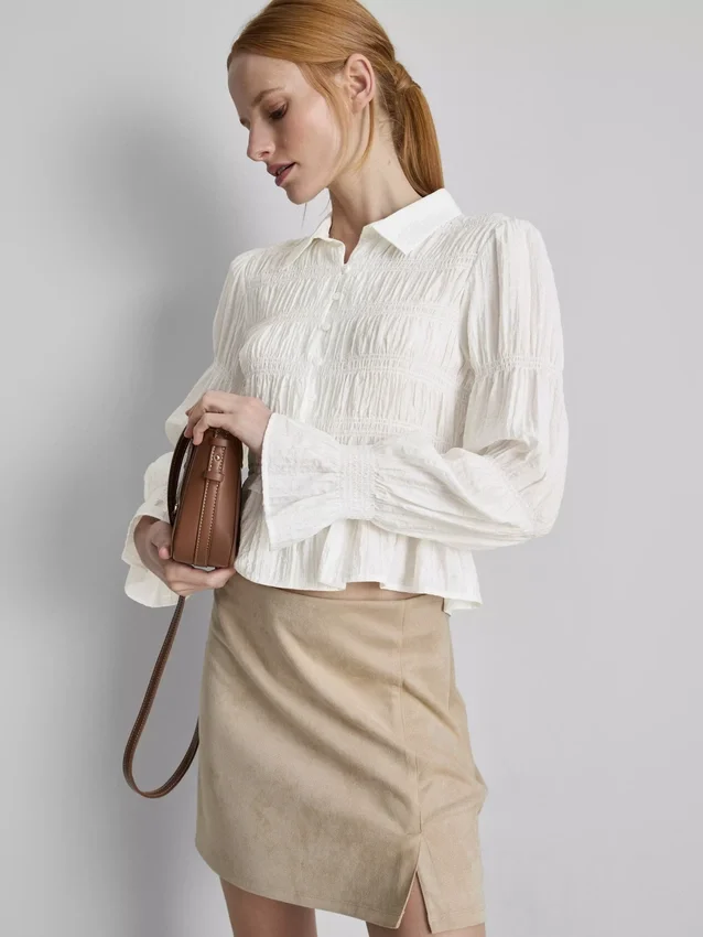 Bluse mit gerafftem Peplum-Saum Bluse mit gerafftem Peplum-Saum