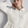 Bluse mit gerafftem Peplum-Saum Bluse mit gerafftem Peplum-Saum