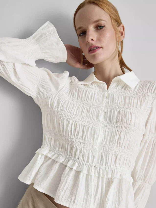 Bluse mit gerafftem Peplum-Saum Bluse mit gerafftem Peplum-Saum