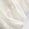 Bluse mit gerafftem Peplum-Saum Bluse mit gerafftem Peplum-Saum