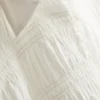 Bluse mit gerafftem Peplum-Saum Bluse mit gerafftem Peplum-Saum