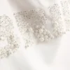 Braut-Badeanzug mit Perlenverzierung Braut-Badeanzug mit Perlenverzierung