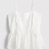Cami-Top aus Baumwolle mit besticktem Peplum-Saum