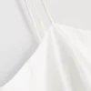 Cami-Top aus Baumwolle mit besticktem Peplum-Saum