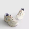 Chunky-Sneaker mit Blumenmotiven