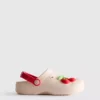 Clogs mit Frucht-Emblem