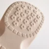 Clogs mit Frucht-Emblem