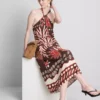 Das bedruckte Midi-Kleid im Neckholder-Stil aus Leinenmischung Das bedruckte Midi-Kleid im Neckholder-Stil aus Leinenmischung