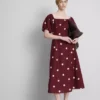 Das Midi-Kleid „The Edit“ aus Leinen mit Puffärmeln Das Midi-Kleid „The Edit“ aus Leinen mit Puffärmeln