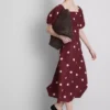 Das Midi-Kleid „The Edit“ aus Leinen mit Puffärmeln Das Midi-Kleid „The Edit“ aus Leinen mit Puffärmeln