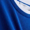 Doppellagiges T-Shirt mit Rundhalsausschnitt Doppellagiges T-Shirt mit Rundhalsausschnitt