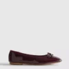 Flache Schuhe mit Lack