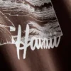 Geradliniges Grafik-T-Shirt aus Baumwolle Geradliniges Grafik-T-Shirt aus Baumwolle