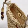 Gewebte Handytasche mit Perlenverzierung