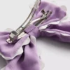 Haarspange mit Schleife und Wellenrand