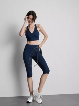 Hoch taillierte, glatte Active-Capri-Leggings mit Stützfunktion Hoch taillierte, glatte Active-Capri-Leggings mit Stützfunktion