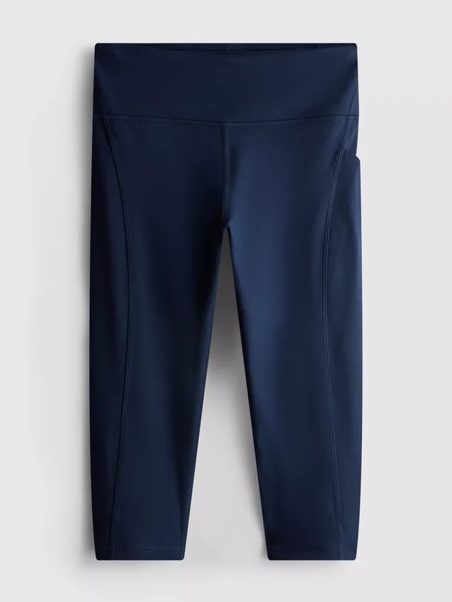 Hoch taillierte, glatte Active-Capri-Leggings mit Stützfunktion Hoch taillierte, glatte Active-Capri-Leggings mit Stützfunktion
