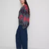 Hoch taillierte, konisch zulaufende Jeans aus Baumwoll-Denim Hoch taillierte, konisch zulaufende Jeans aus Baumwoll-Denim