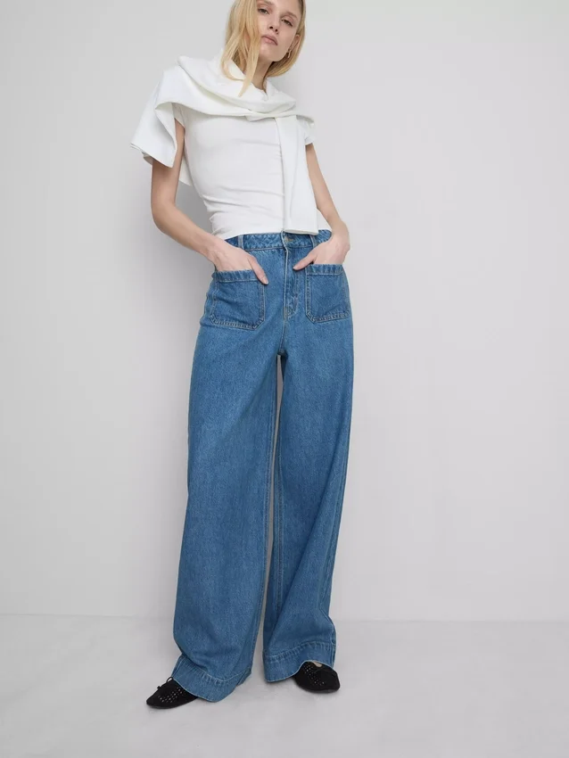 Jeans mit weitem Bein und Taschen vorne Jeans mit weitem Bein und Taschen vorne