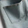 Jeansshorts mit mittlerer Leibhöhe und Umschlag Jeansshorts mit mittlerer Leibhöhe und Umschlag