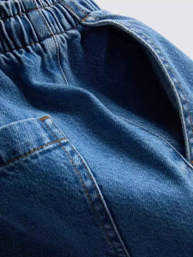 Jogginghose aus Baumwoll-Denim mit konischer Passform Jogginghose aus Baumwoll-Denim mit konischer Passform