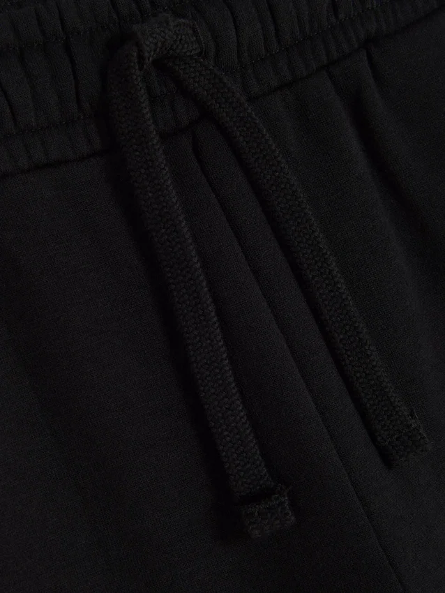 Jogginghose mit Kordelzug und elastischem Bund Jogginghose mit Kordelzug und elastischem Bund