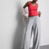 Jogginghose mit weitem Bein und Falten aus baumwollreichem Material Jogginghose mit weitem Bein und Falten aus baumwollreichem Material