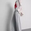 Jogginghose mit weitem Bein und Falten aus baumwollreichem Material Jogginghose mit weitem Bein und Falten aus baumwollreichem Material