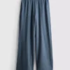 Jogginghose mit weitem Bein und Falten aus baumwollreichem Material Jogginghose mit weitem Bein und Falten aus baumwollreichem Material