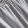 Jogginghose mit weitem Bein und Falten aus baumwollreichem Material Jogginghose mit weitem Bein und Falten aus baumwollreichem Material