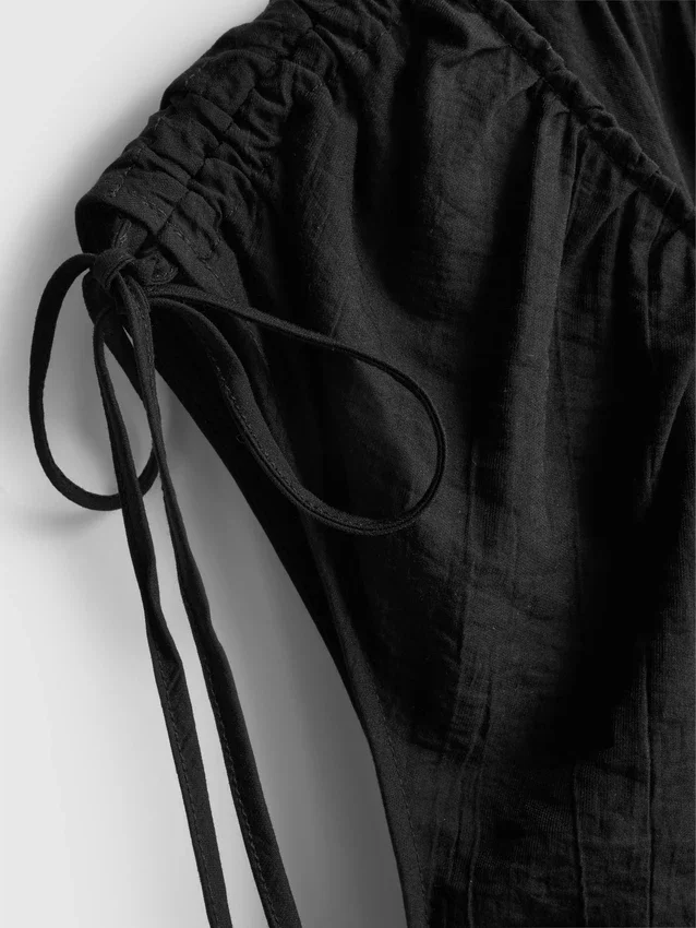 Jumpsuit mit V-Ausschnitt und Ballonbeinen Jumpsuit mit V-Ausschnitt und Ballonbeinen