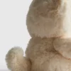 Kleines Plüschtier in Form einer getigerten Katze Kleines Plüschtier in Form einer getigerten Katze