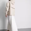 Kurze, taillierte Regenjacke Kurze, taillierte Regenjacke