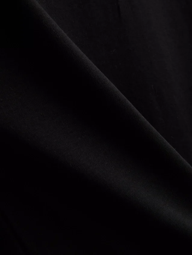 Kurzes, ärmelloses T-Shirt mit Schulterpolstern Kurzes, ärmelloses T-Shirt mit Schulterpolstern