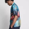 Kurzärmeliges Hemd mit Knöpfen und Flamingo-Print Kurzärmeliges Hemd mit Knöpfen und Flamingo-Print