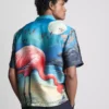 Kurzärmeliges Hemd mit Knöpfen und Flamingo-Print Kurzärmeliges Hemd mit Knöpfen und Flamingo-Print