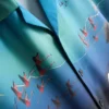 Kurzärmeliges Hemd mit Knöpfen und Flamingo-Print Kurzärmeliges Hemd mit Knöpfen und Flamingo-Print
