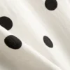 Lang geschnittenes Spitzen-Tanktop aus Baumwollmischung Lang geschnittenes Spitzen-Tanktop aus Baumwollmischung