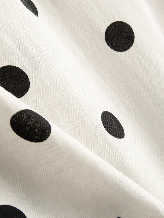 Lang geschnittenes Spitzen-Tanktop aus Baumwollmischung Lang geschnittenes Spitzen-Tanktop aus Baumwollmischung