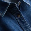 Locker sitzendes Baumwoll-Denim-Hemd mit Knopfleiste Locker sitzendes Baumwoll-Denim-Hemd mit Knopfleiste