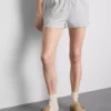 Lounge-Shorts aus Baumwolle mit geschlitztem Saum Lounge-Shorts aus Baumwolle mit geschlitztem Saum