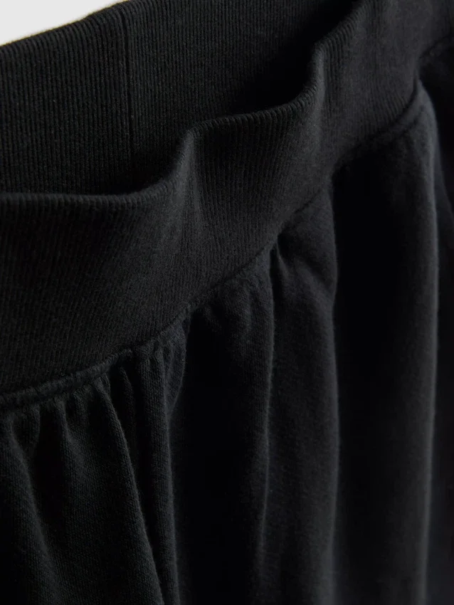 Lounge-Shorts aus Baumwolle mit geschlitztem Saum Lounge-Shorts aus Baumwolle mit geschlitztem Saum