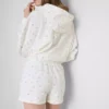 Lässige Shorts mit Blumenmuster aus baumwollreichem Material Lässige Shorts mit Blumenmuster aus baumwollreichem Material