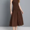 Midi-Kleid aus Baumwolle mit gerüschtem Rundhalsausschnitt Midi-Kleid aus Baumwolle mit gerüschtem Rundhalsausschnitt