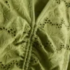 Mini-Kleid aus Baumwolle mit Lochstickerei und Rüschen Mini-Kleid aus Baumwolle mit Lochstickerei und Rüschen