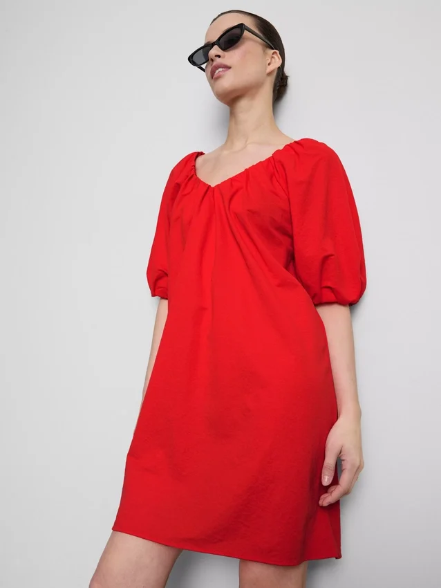Mini-Smockkleid mit Puffärmeln Mini-Smockkleid mit Puffärmeln