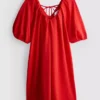 Mini-Smockkleid mit Puffärmeln Mini-Smockkleid mit Puffärmeln