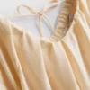 Mini-Smockkleid mit Puffärmeln Mini-Smockkleid mit Puffärmeln