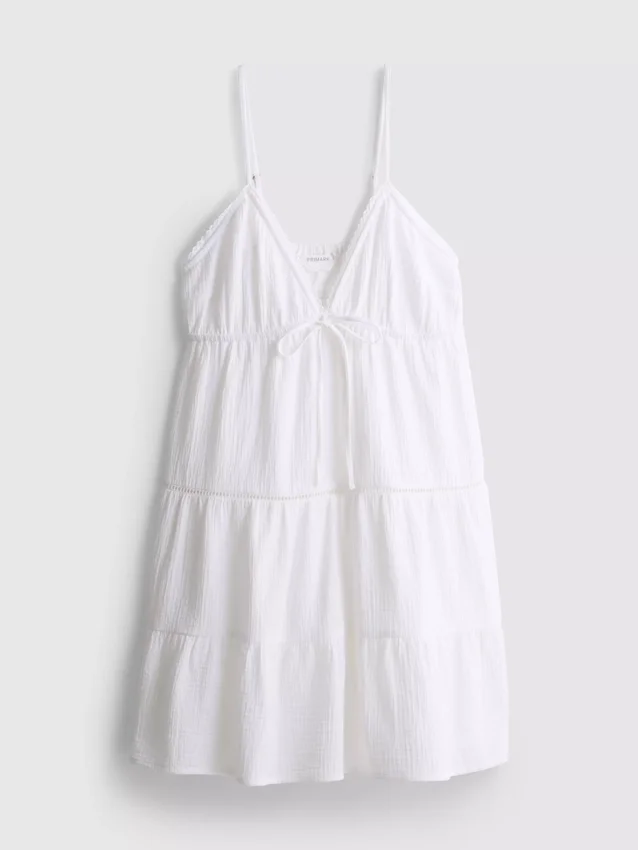 Minikleid aus Baumwolle mit Stufenschnitt und V-Ausschnitt Minikleid aus Baumwolle mit Stufenschnitt und V-Ausschnitt