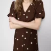 Minikleid mit Knopfleiste und Puffärmeln Minikleid mit Knopfleiste und Puffärmeln